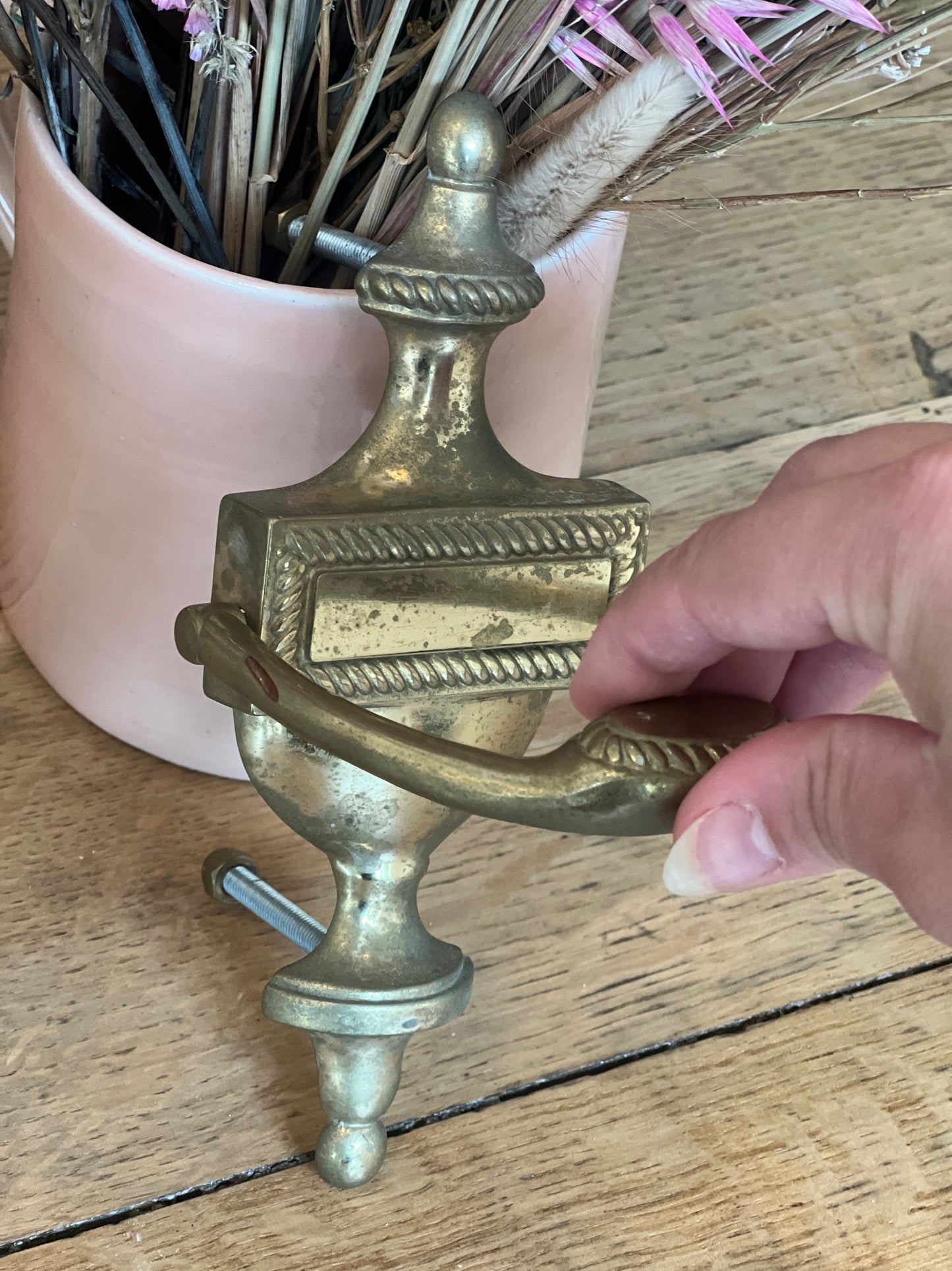 Heurtoir de porte en laiton.