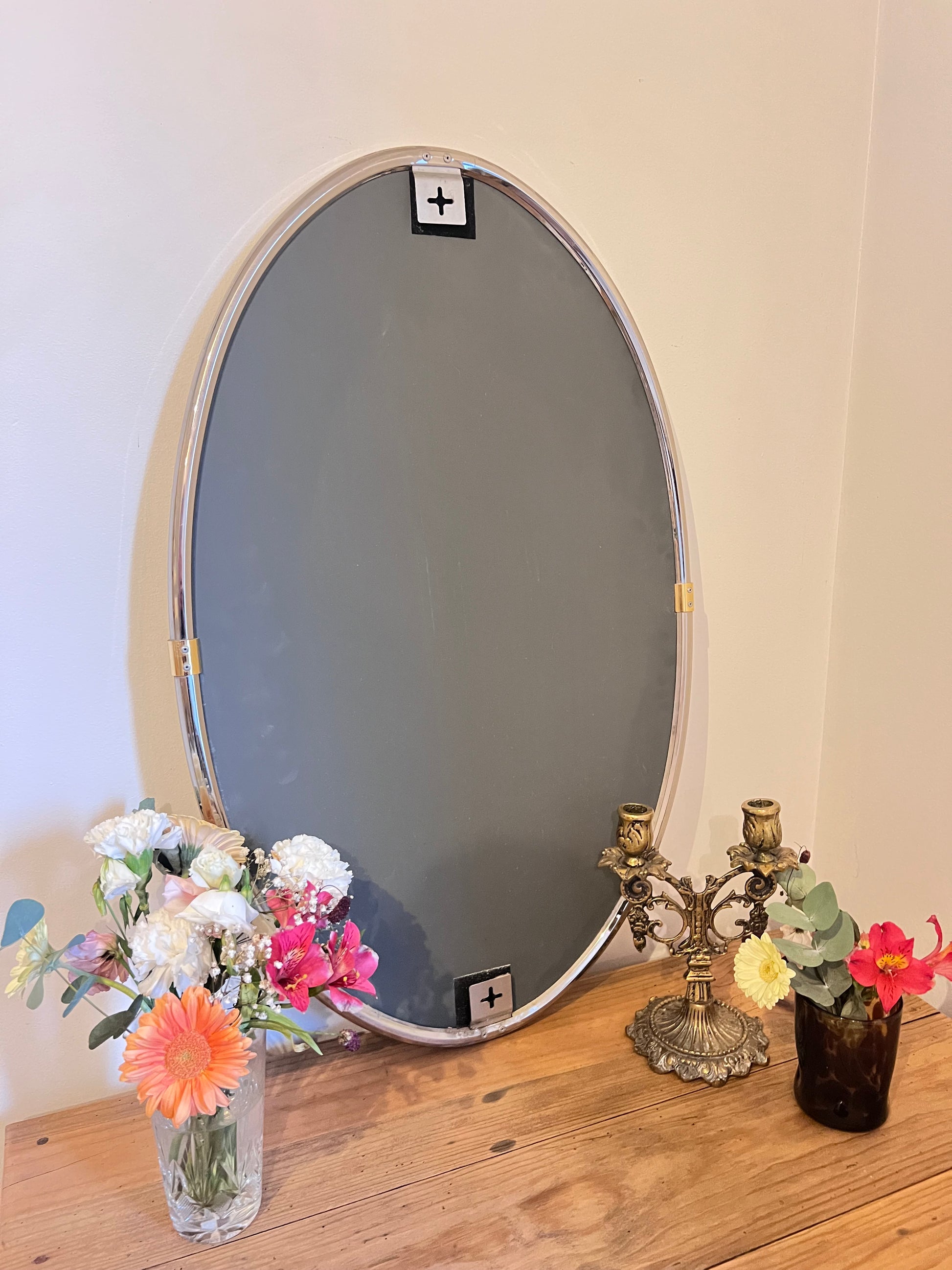 Miroir ovale en métal, parfait état.